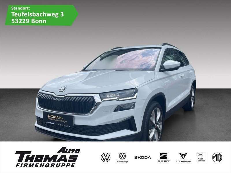 Moonweiss metallic Gebraucht 2024 Skoda Karoq Selection SUV | 37.880 € (Teuer) - Bild 1/3