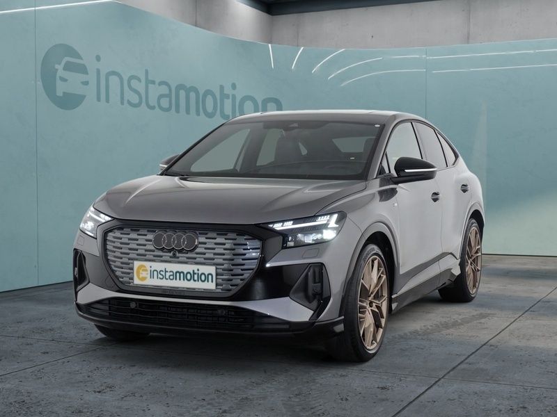 Grau Gebraucht 2022 Audi Q4 Sportback e-tron Sport SUV | 37.640 € (Guter Preis) - Bild 1/3