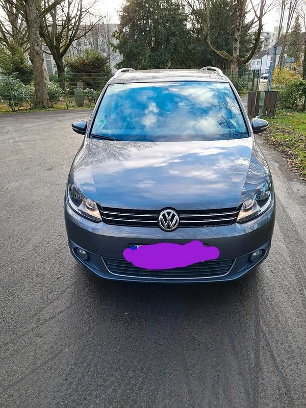 Gebraucht VW Touran Life 105 PS (77 kW) 2014 Braun Van / Kleinbus