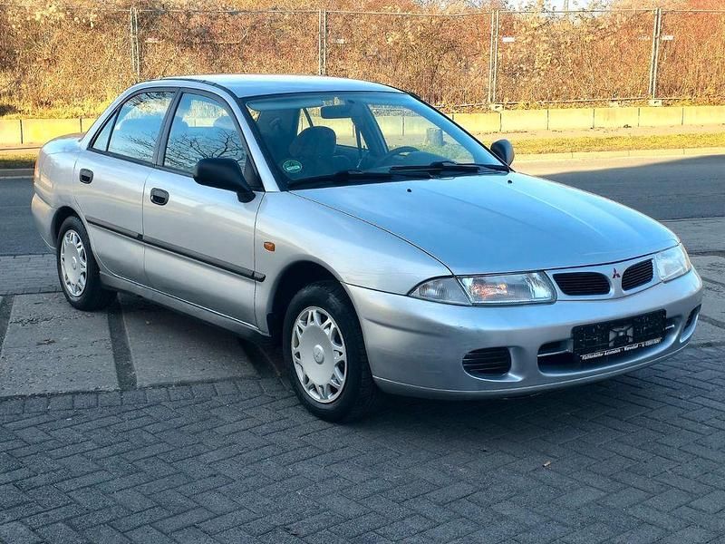 Gebraucht Mitsubishi Carisma 90 PS (66 kW) 1998 Silber Limousine
