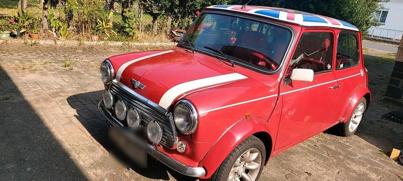 Second-hand Rover Mini 63 CP (46 kW) 1998 Roșu Hatchback