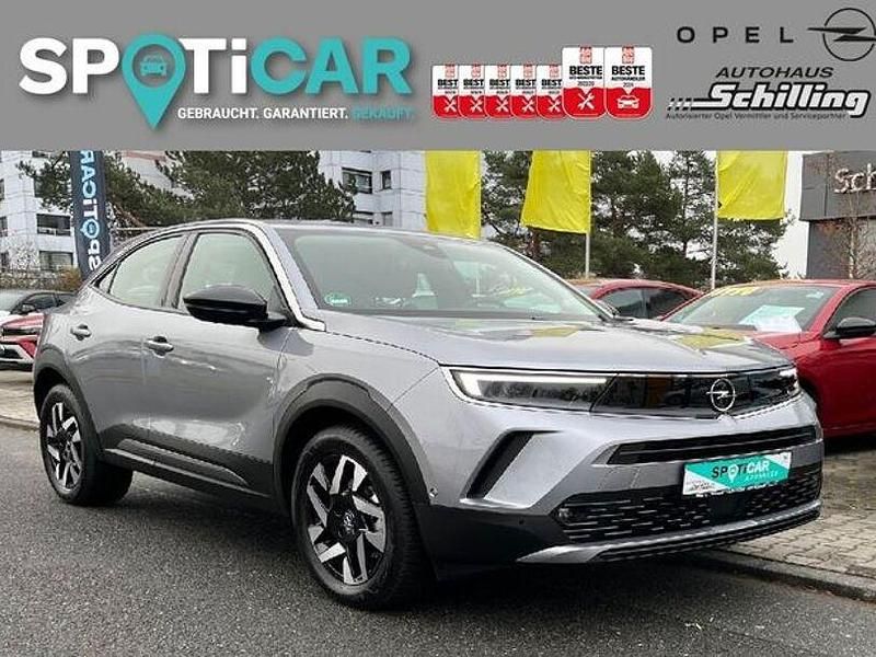 Kontrast grau Gebraucht 2023 Opel Mokka-e Elegance SUV | 23.290 € (Teuer) - Bild 1/2