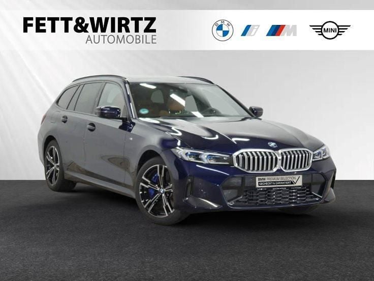 Bmw individual tansanitblau metallic Gebraucht 2024 BMW 330e M Sport Kombi | 49.888 € (Etwas zu teuer) - Bild 1/3
