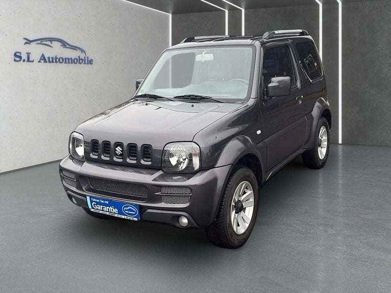 Grau Gebraucht 2012 Suzuki Jimny Comfort SUV | 14.990 € (Fairer Preis) - Bild 1/4