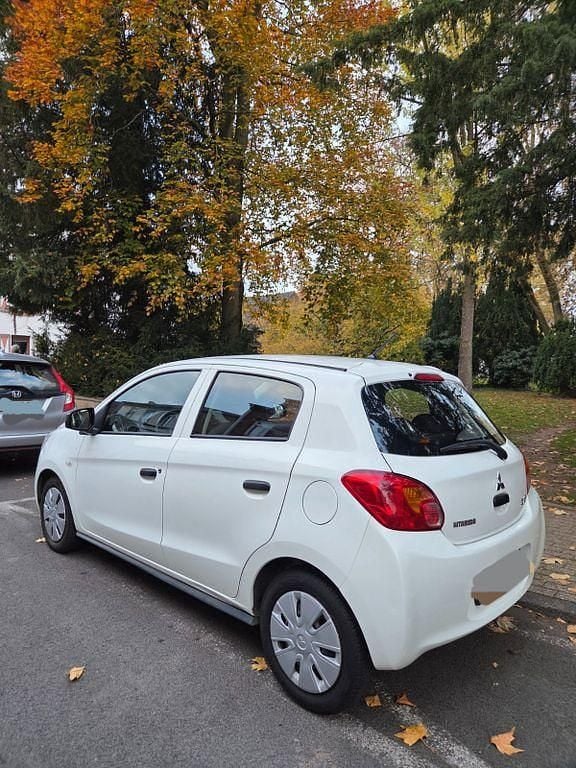 Gebraucht Mitsubishi Space Star 71 PS (52 kW) 2015 Weiß Limousine