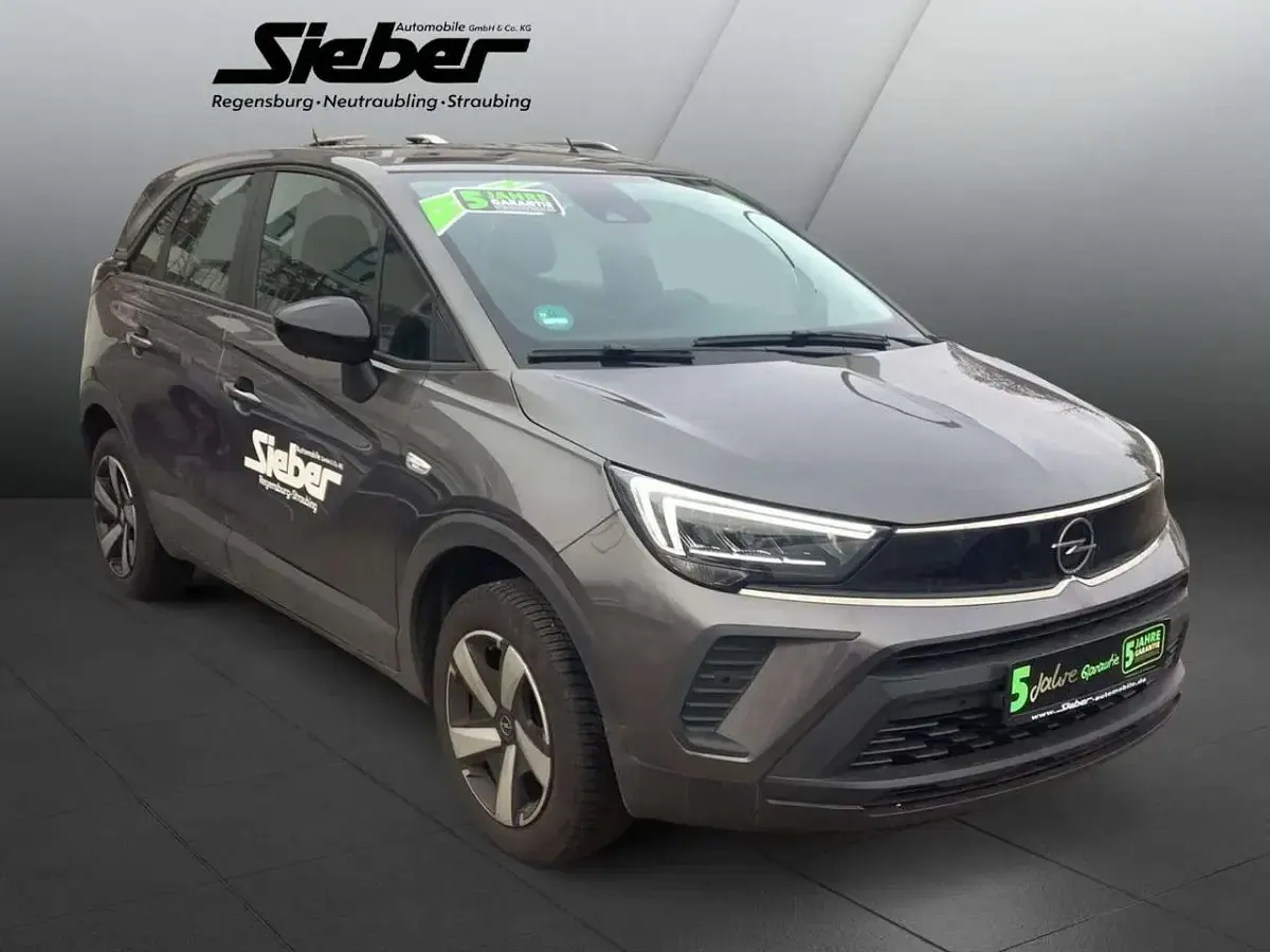 Gebraucht Opel Crossland Enjoy 131 PS (96 kW) 2023 Mondstein grau/e:vulkan grau SUV