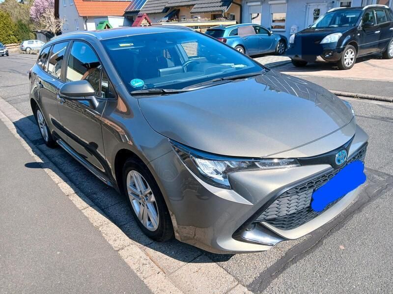 Grün Gebraucht 2022 Toyota Corolla Kombi | 23.500 € - Bild 1/4