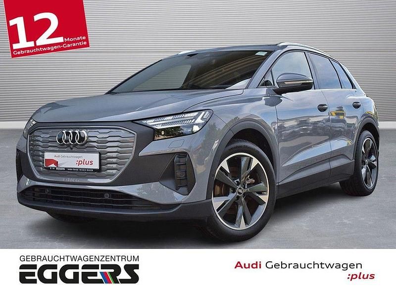 Grau Gebraucht 2022 Audi Q4 e-tron Sport SUV | 29.950 € (Teuer) - Bild 1/4