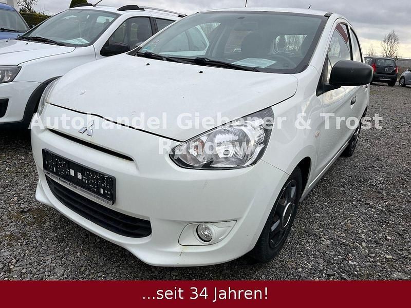 Weiß Gebraucht 2014 Mitsubishi Space Star Kleinwagen | 3.500 € (Fairer Preis) - Bild 1/4