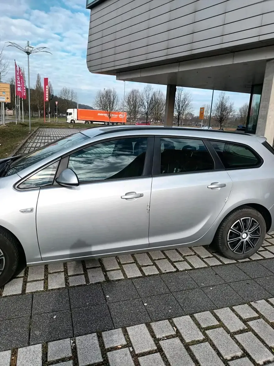 Second-hand Opel Astra 140 CP (102 kW) 2011 Argintiu Break
