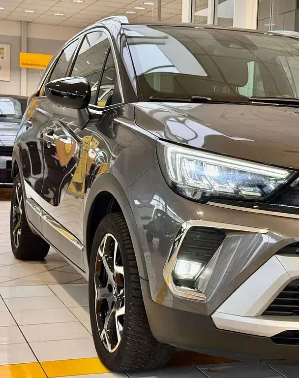 Gebraucht Opel Crossland Ultimate 131 PS (96 kW) 2022 Mondstein grau/e:vulkan grau SUV