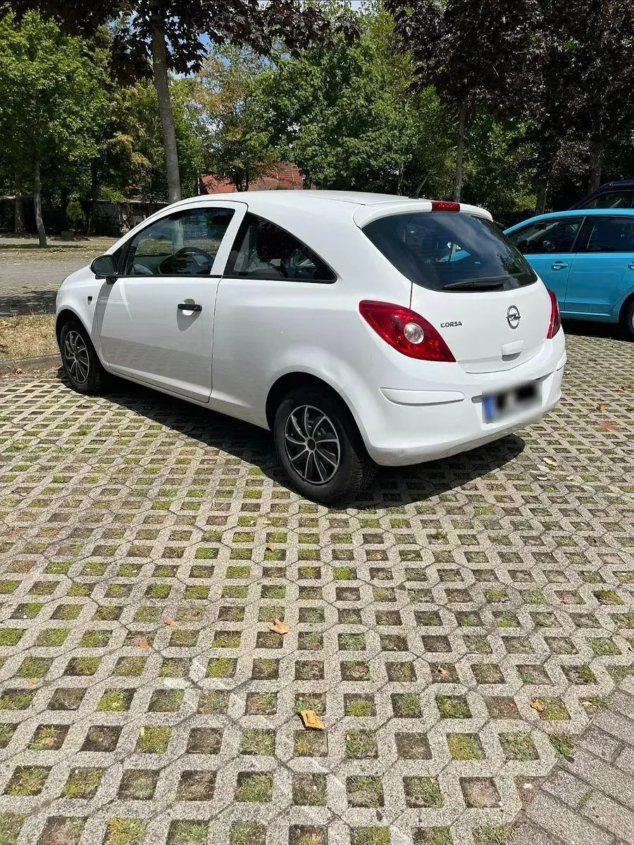 Gebraucht Opel Corsa 69 PS (50 kW) 2014 Weiß Kleinwagen