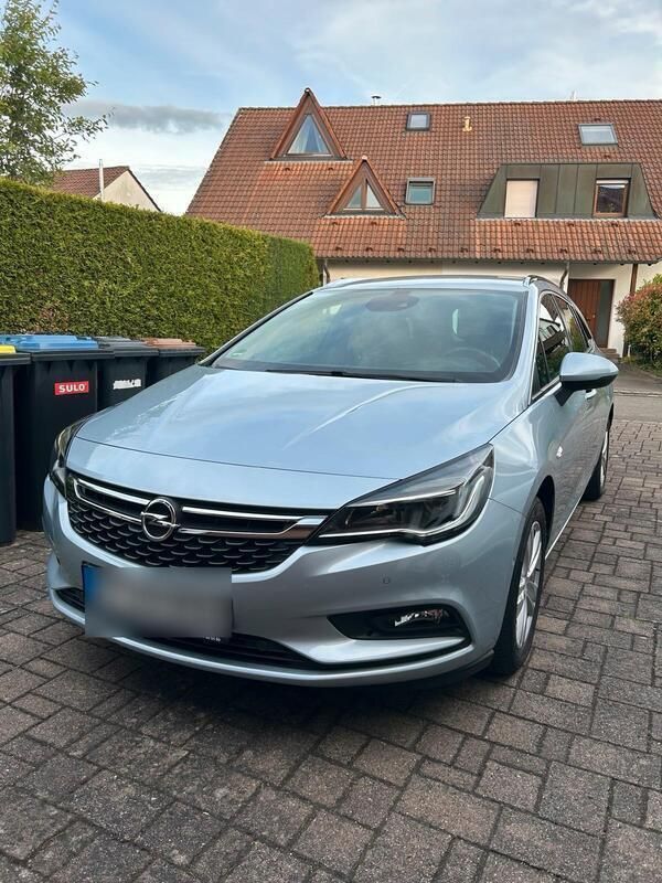 Silber Gebraucht 2017 Opel Astra Kombi | 11.950 € (Fairer Preis) - Bild 1/4