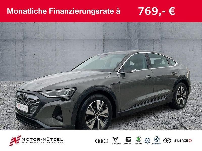 Chronosgrau metallic Gebraucht 2023 Audi Q8 Sportback e-tron Advanced SUV | 57.930 € (Superpreis) - Bild 1/4