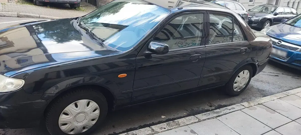 Gebraucht Mazda 323 95 PS (69 kW) 2001 Blau Limousine