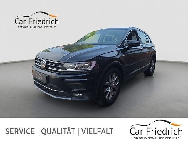 Deep black (metallic) Gebraucht 2021 VW Tiguan Highline SUV | 25.650 € (Guter Preis) - Bild 1/4