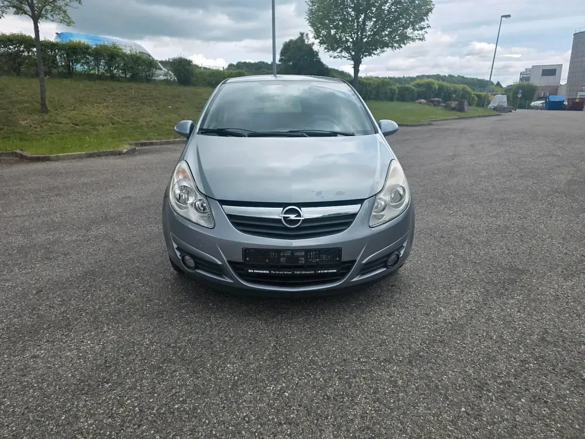Usado Opel Corsa Catch Me 80 HP (58 kW) 2007 Cinzento Citadino