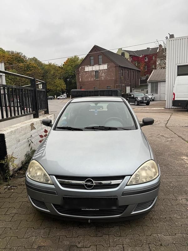 Grau Gebraucht 2004 Opel Corsa Kleinwagen | 500 € - Bild 1/4