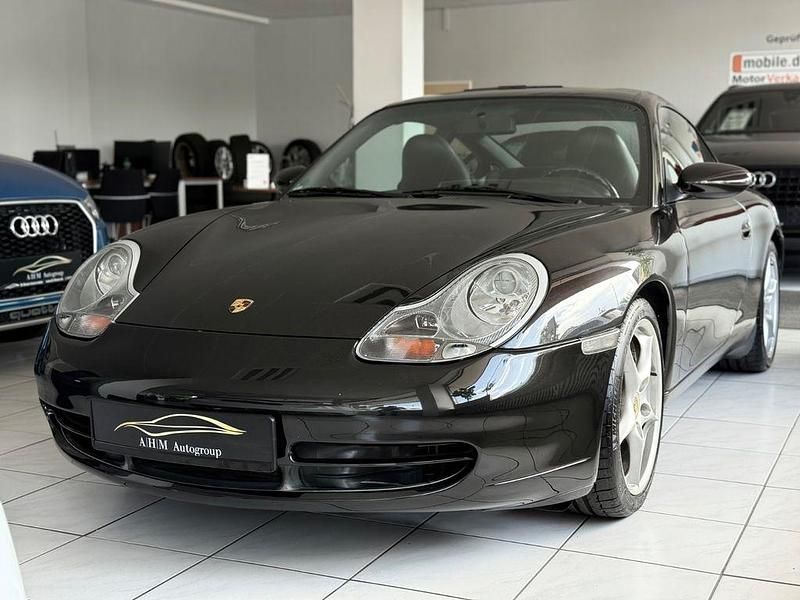 Schwarz Gebraucht 1999 Porsche 911 Carrera 4 Coupé | 29.490 € (Fairer Preis) - Bild 1/4