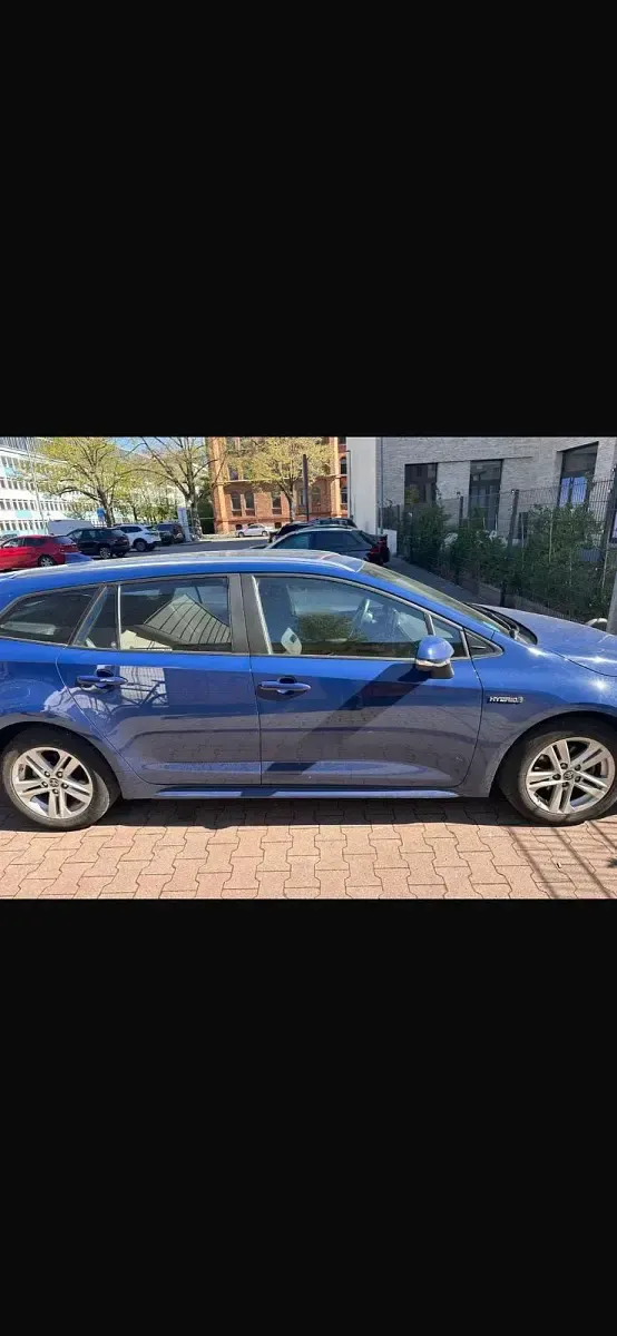 Gebraucht Toyota Corolla Hybrid 98 PS (72 kW) 2019 Blau Kombi