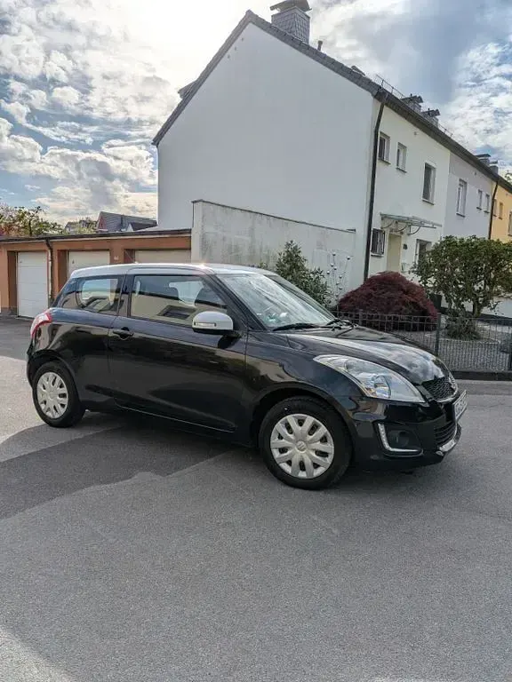 Usado Suzuki Swift 94 HP (69 kW) 2014 Preto Citadino