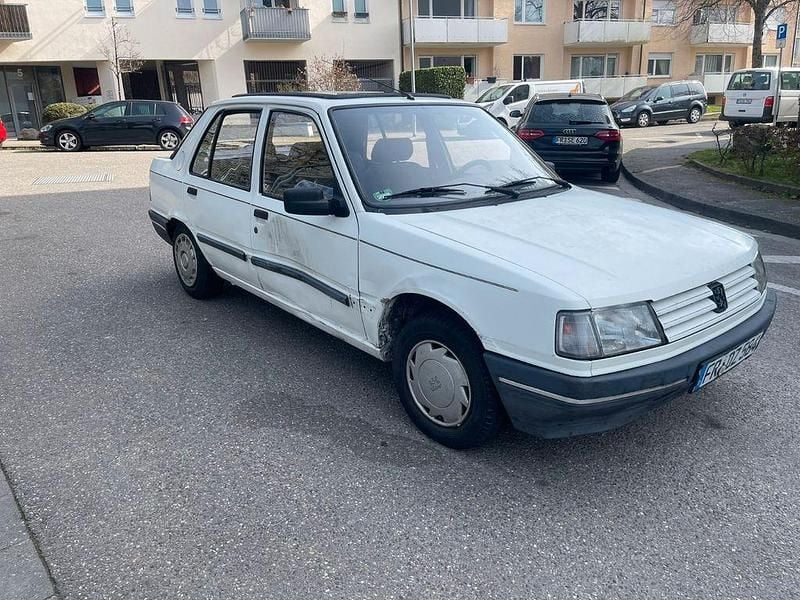 Gebraucht Peugeot 309 75 PS (55 kW) 1990 Weiß Kleinwagen