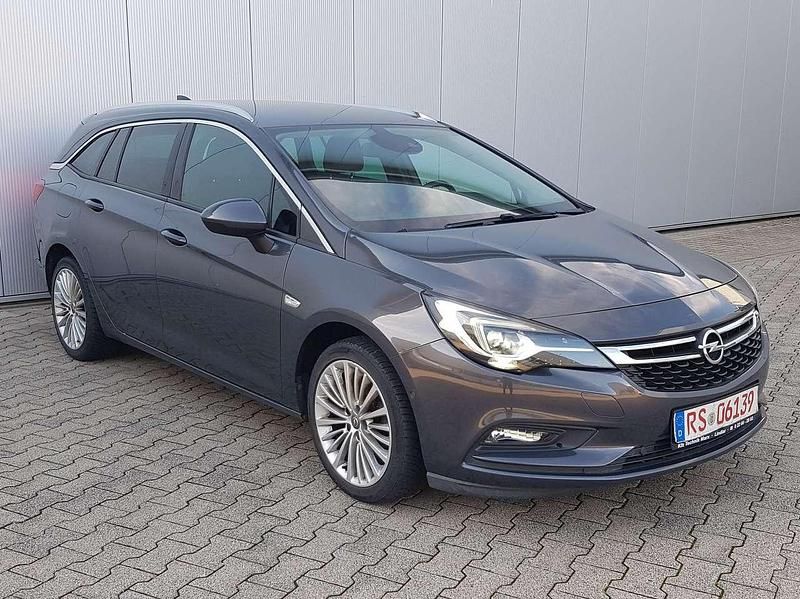 Grau Gebraucht 2016 Opel Astra Business Kombi | 6.499 € (Fairer Preis) - Bild 1/4
