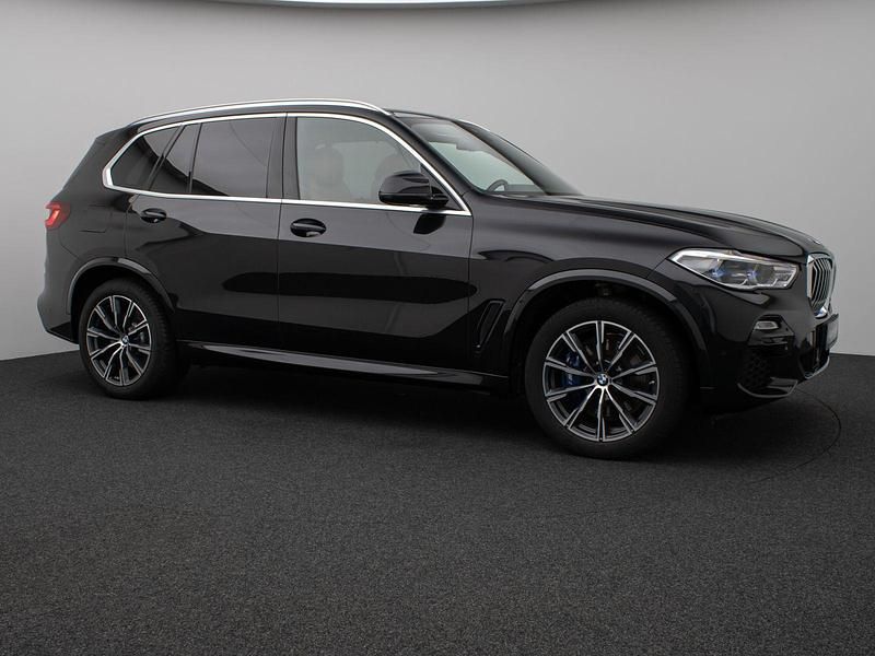 Gebraucht BMW X5 M Sport 394 PS (289 kW) 2021 Saphirschwarz metallic475braun SUV