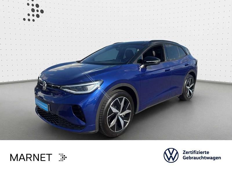 Blue dusk metallic/schwarz Gebraucht 2025 VW ID.4 GTX SUV | 43.590 € (Fairer Preis) - Bild 1/3