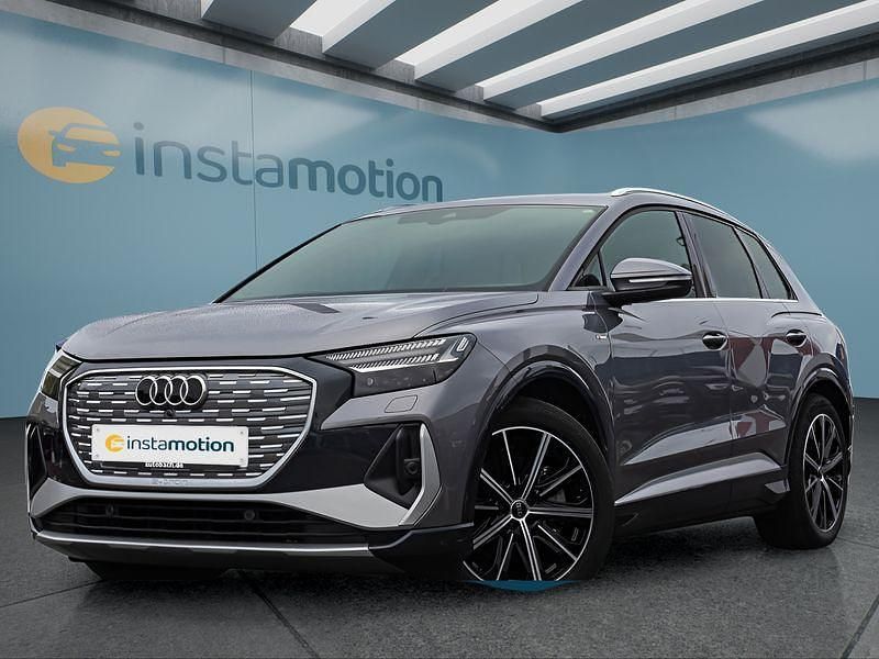 Grau Gebraucht 2022 Audi Q4 e-tron S-Line SUV | 28.599 € (Fairer Preis) - Bild 1/4