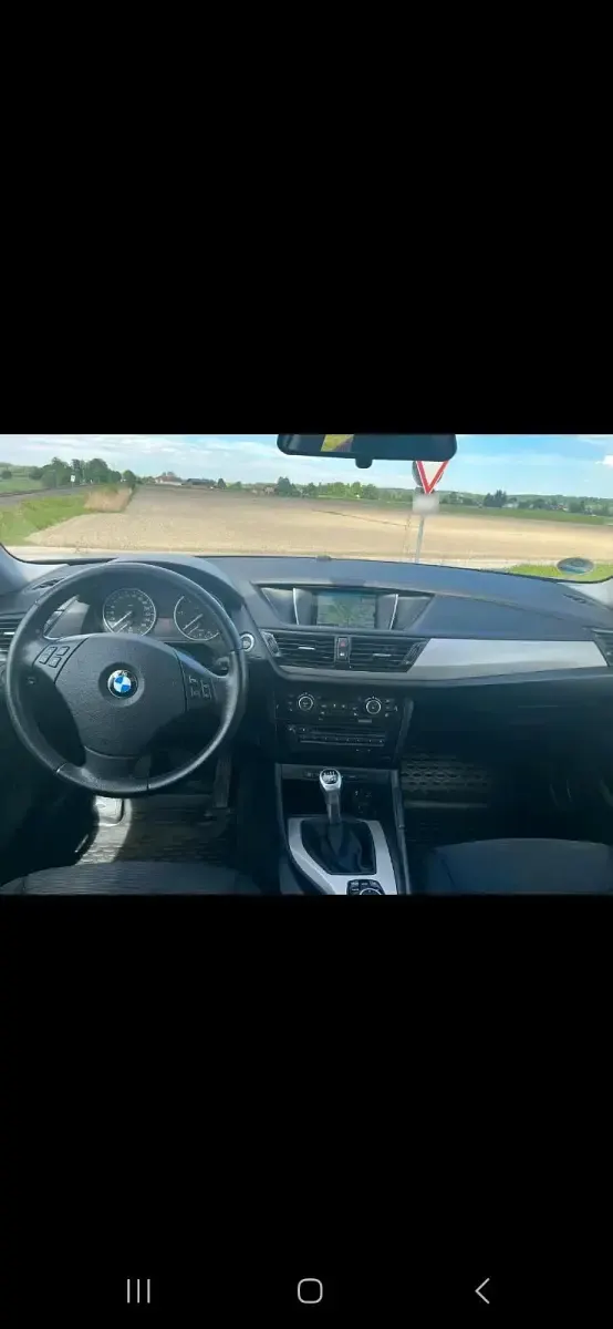 Second-hand BMW X1 140 CP (102 kW) 2014 Negru SUV