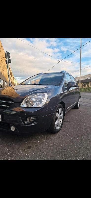 Grau Gebraucht 2007 Kia Carens Van / Kleinbus | 3.900 € (Fairer Preis) - Bild 1/4