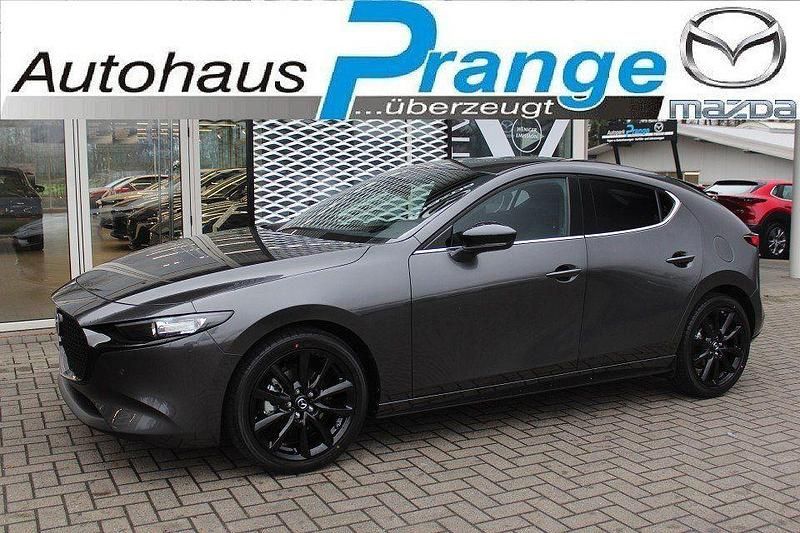 Machine gray Neu 2025 Mazda 3 Homura-Line Limousine | 26.885 € - Bild 1/4