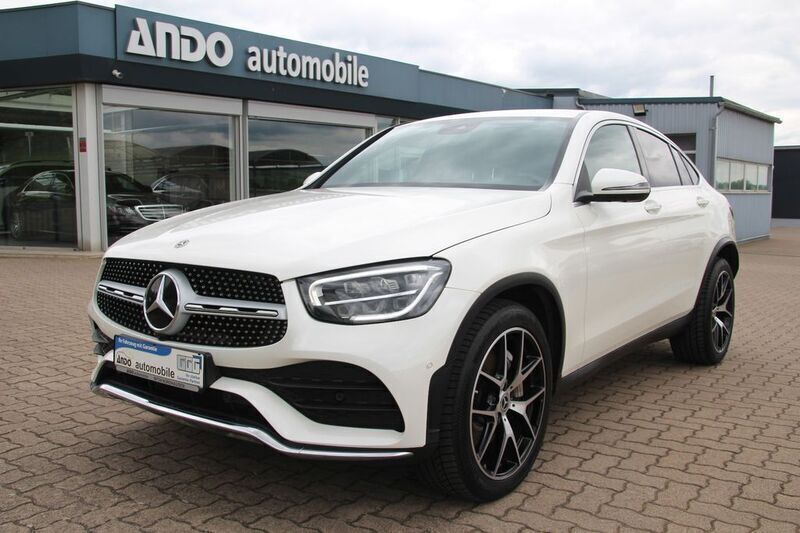 Diamantweiss metalliclack Gebraucht 2022 Mercedes GLC300 AMG line Coupé | 46.300 € (Fairer Preis) - Bild 1/4