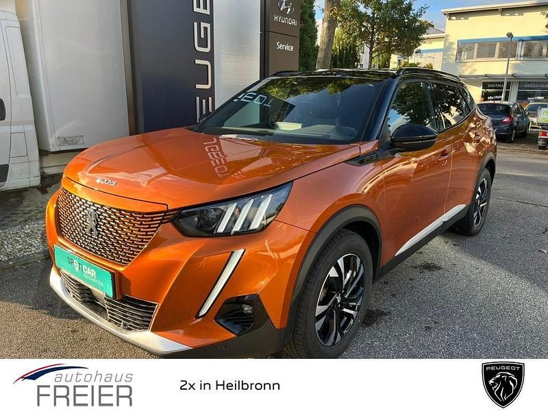 Orange Gebraucht 2021 Peugeot e-2008 GT SUV | 15.990 € (Fairer Preis) - Bild 1/4