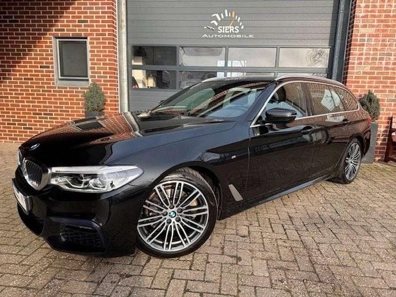 Schwarz Gebraucht 2018 BMW 518 M Sport Kombi | 17.950 € (Guter Preis) - Bild 1/4