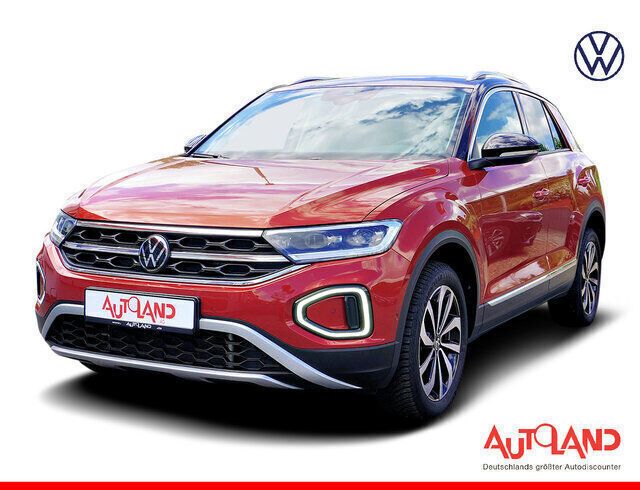 Kings red metallic (metallic) Gebraucht 2024 VW T-Roc Style SUV | 33.990 € (Etwas zu teuer) - Bild 1/4
