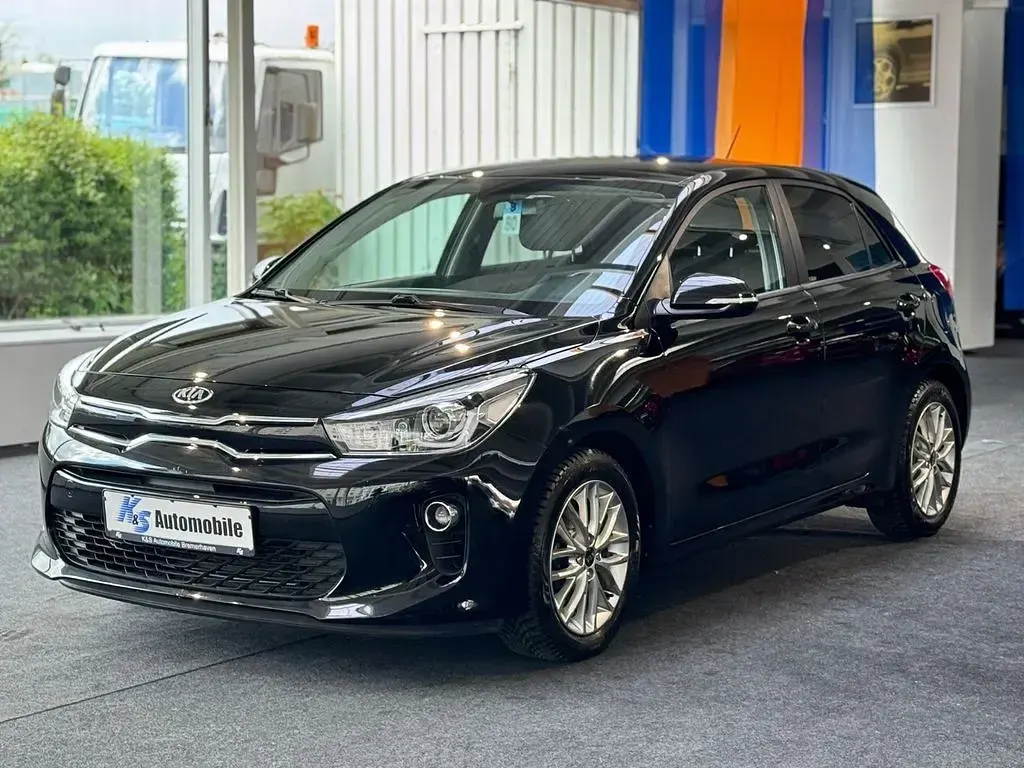 Gebraucht Kia Rio 99 PS (72 kW) 2017 Schwarz Limousine