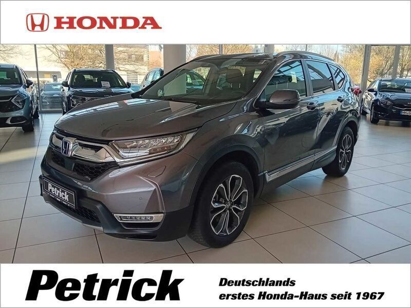 Modern steel (metallic) Gebraucht 2021 Honda CR-V Executive SUV | 31.990 € (Fairer Preis) - Bild 1/4