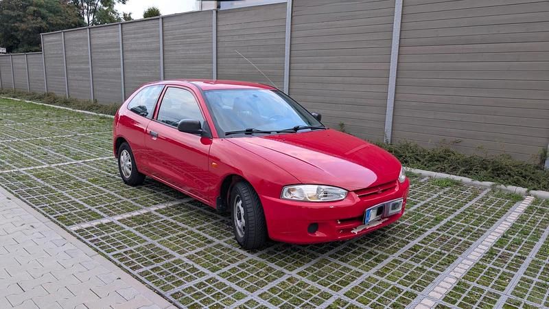 Rot Gebraucht 2000 Mitsubishi Colt Kleinwagen | 2.450 € - Bild 1/4