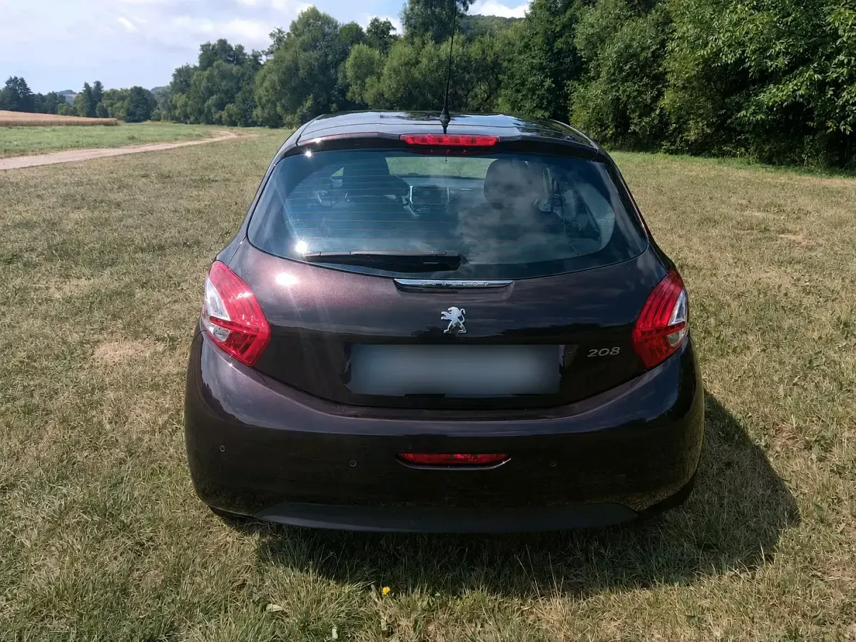 Gebraucht Peugeot 208 Style 82 PS (60 kW) 2013 Braun Kleinwagen