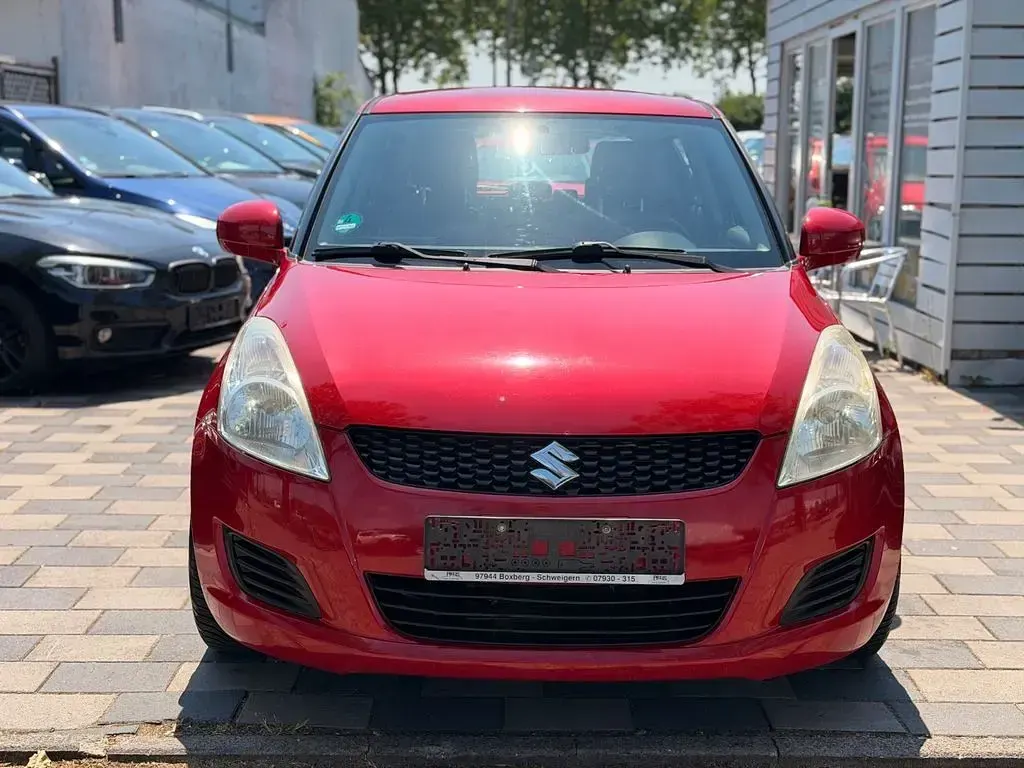 Gebraucht Suzuki Swift Club 94 PS (69 kW) 2010 Rot Kleinwagen