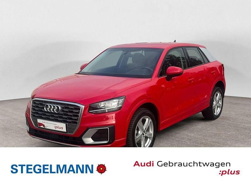 Tangorot metallic Gebraucht 2020 Audi Q2 Sport SUV | 22.610 € (Fairer Preis) - Bild 1/4