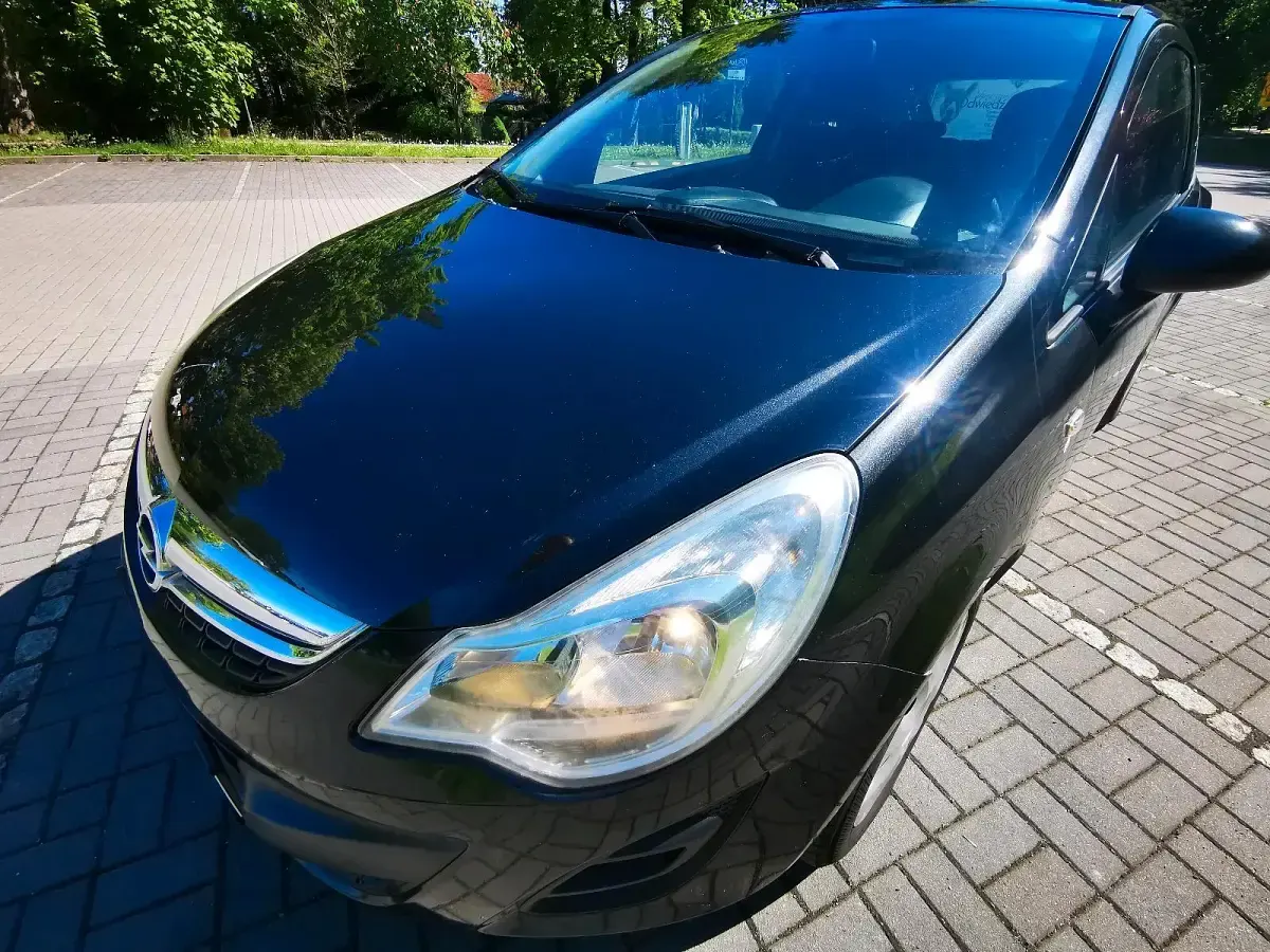 Używany Opel Corsa 86 KM (63 kW) 2012 Czarny Hatchback