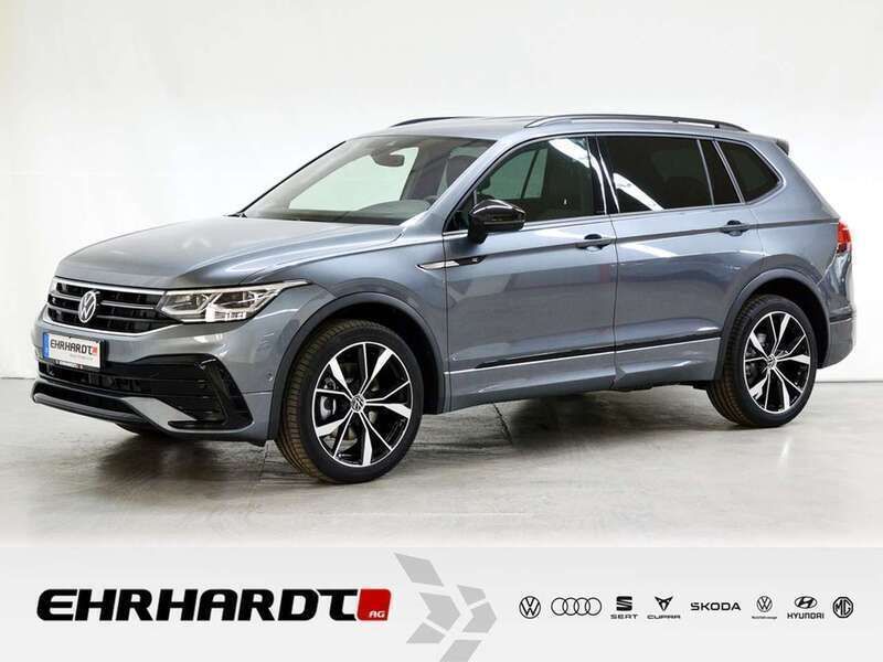 Platinum grey metallic Gebraucht 2024 VW Tiguan Allspace R-line SUV | 41.590 € (Guter Preis) - Bild 1/4