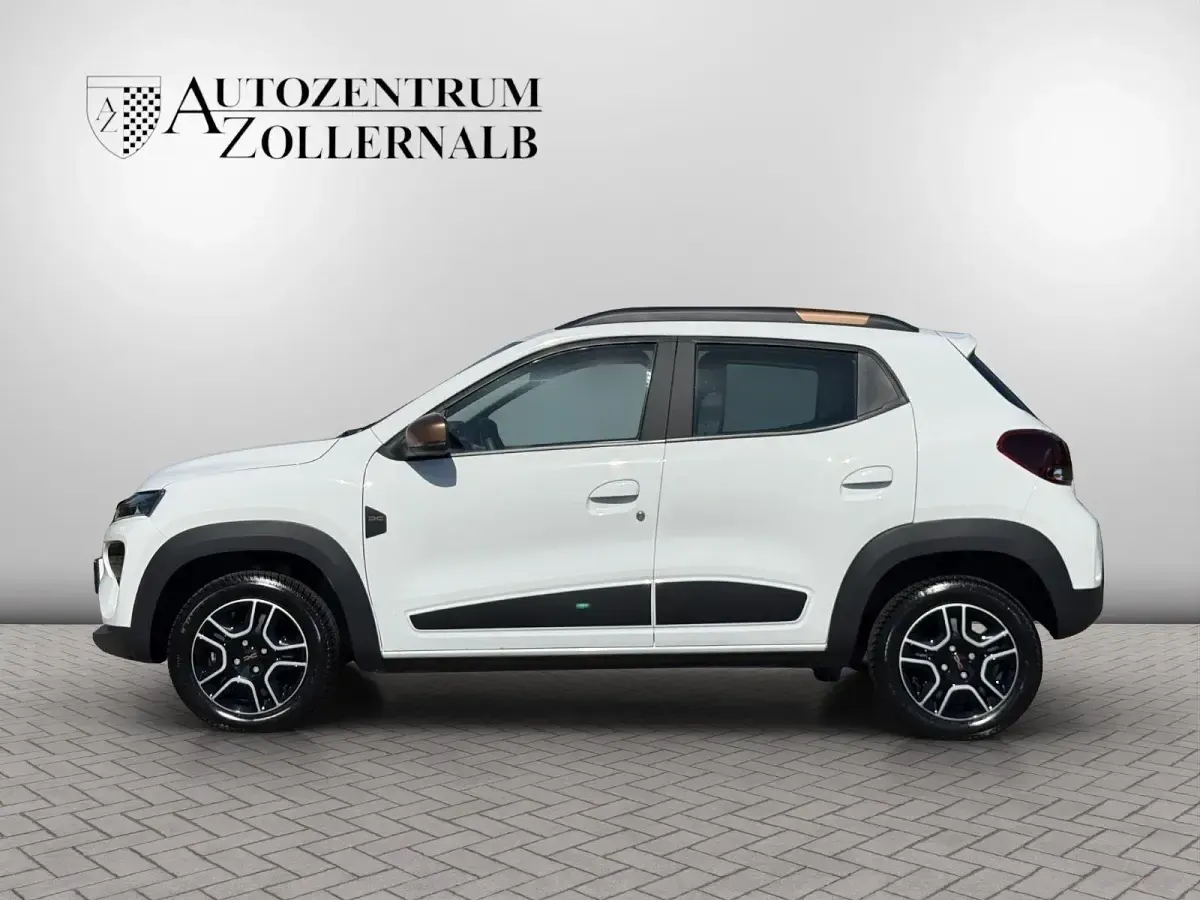Gebraucht Dacia Spring Extreme 66 kW (90 PS) 2023 Weiß Kleinwagen