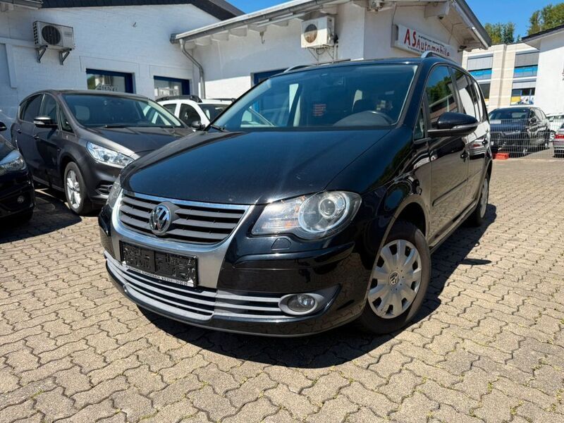 Deep black perleffekt Gebraucht 2010 VW Touran Freestyle Van / Kleinbus | 4.349 € (Superpreis) - Bild 1/4