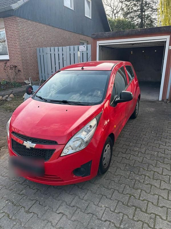 Second-hand Chevrolet Spark 68 CP (50 kW) 2011 Roșu Hatchback