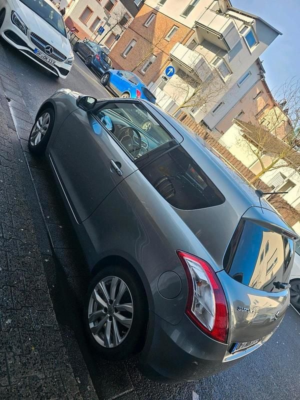 Gebraucht Suzuki Swift 94 PS (69 kW) 2015 Grau Kleinwagen