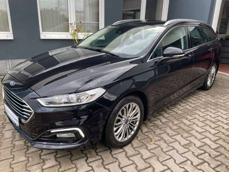 Obsidianschwarz metallic Gebraucht 2020 Ford Mondeo Titanium Kombi | 23.799 € - Bild 1/4